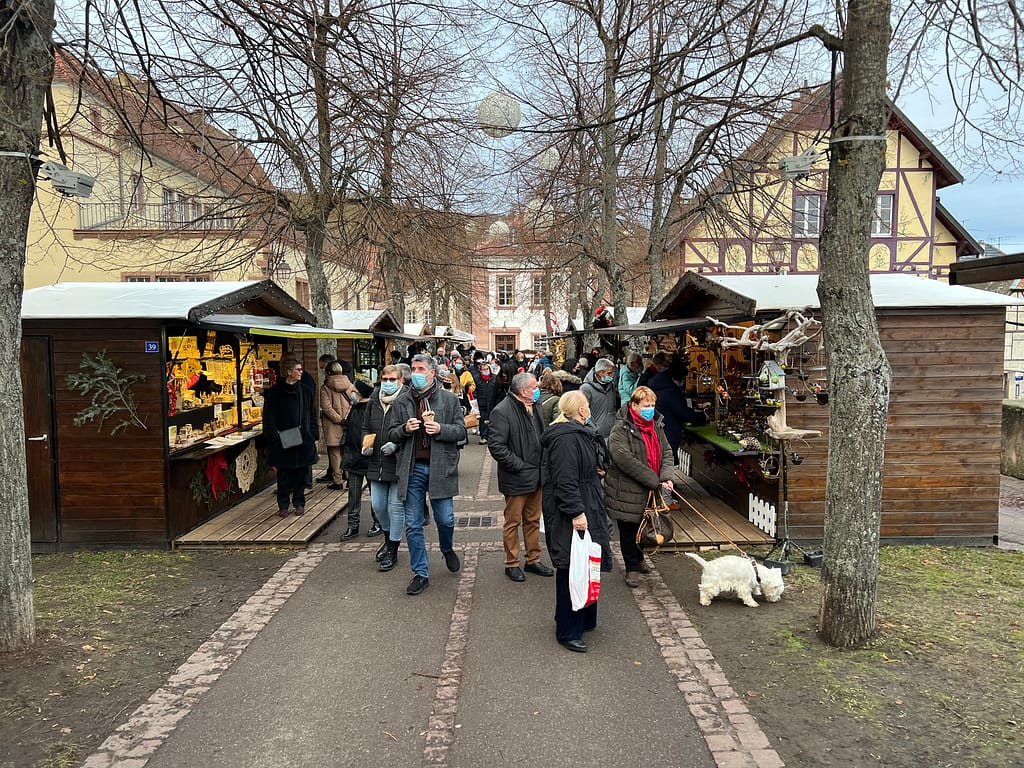 Market vendors in Riquewihr, one of our favorite Christmas Markets near Strasbourg