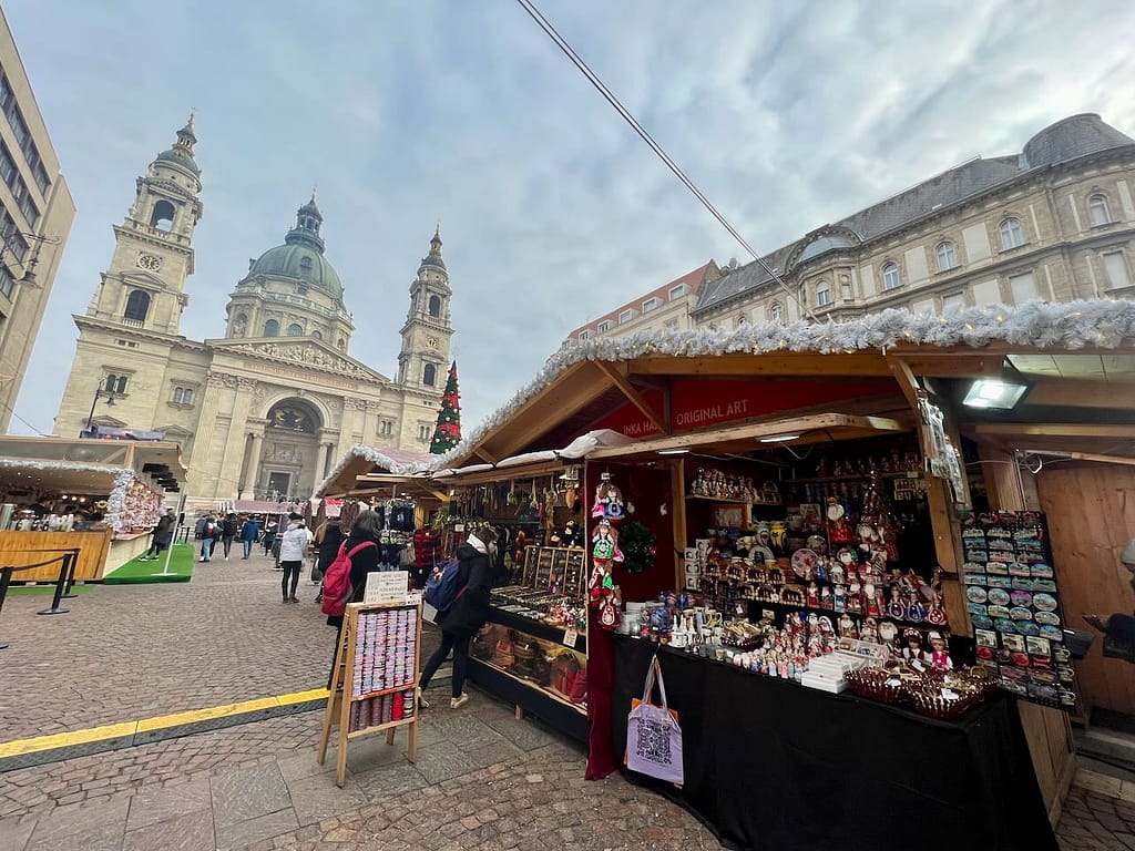 Market Stalls in Budapest's Christmas Markets sell sweaters, hats, and other fun gifts!