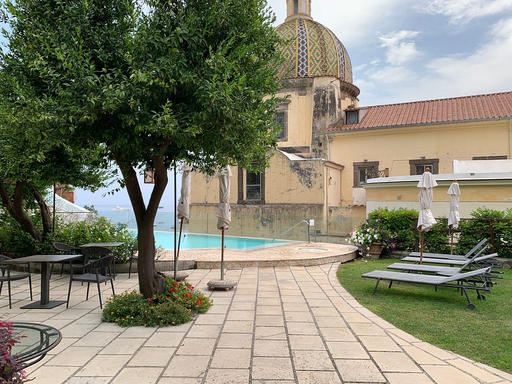 The pool at Hotel Palazzo Murat is located right next to Positano’s main church.