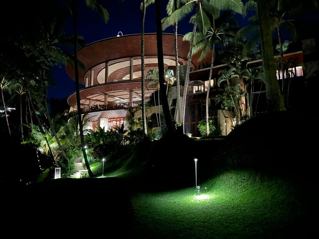 View of the main hotel building at night at the Four Seasons Resort Bali at Sayan